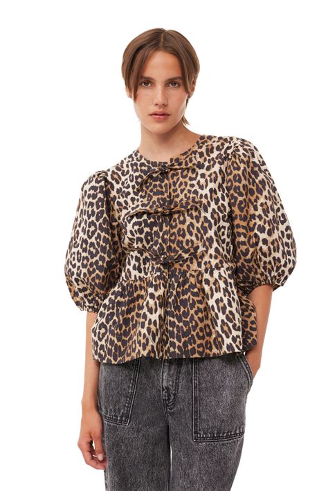 ganni leopard peplum tie blouse.